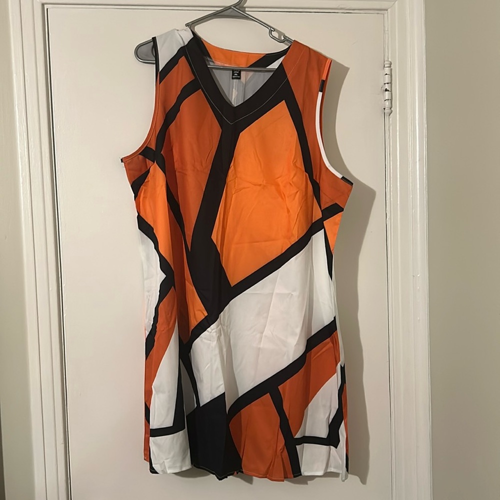 Black, white and orange patterned dress